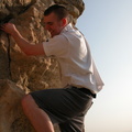 Peter Rawcliffe climbing a cliff