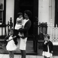 Anna, Ruth being held by Celia and Clare outside 27 Gwyder Crescent
