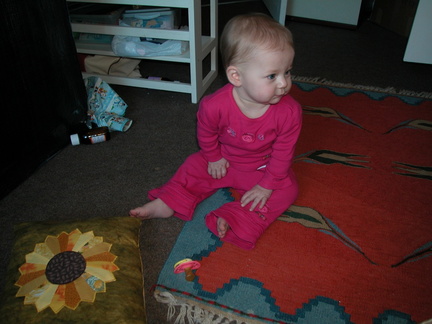 Mia playing on the floor