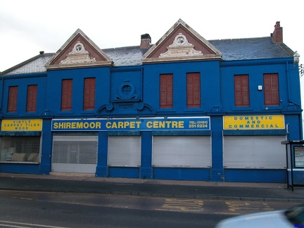 Old Co-Op in Shiremoor, in a delightful shade of blue. The road to the right is 'Co-Operative Terrace'.