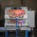 Glass-working irons in an oven