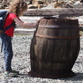Isaac pushing a barrel over