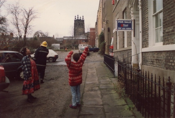 Celia, a fireman, and I think that's me[alex] in the red jumper. Celia had just set fire to the kitchen.