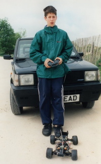 Me[alex] and my remote control car up Crickley Hill, c.1997