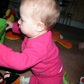 Mia playing in the toy box