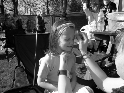 Grace having her face painted