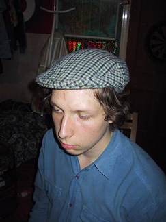 Rob in a flat cap