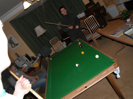 Some people playing pool