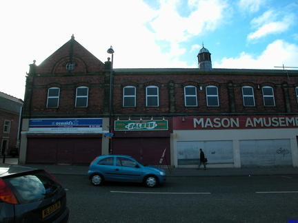 Building on Adelaide Terrace, old caption on the front was 
"Benwell High Cross - 1898 Newcastle upon Tyne Co-Operative So