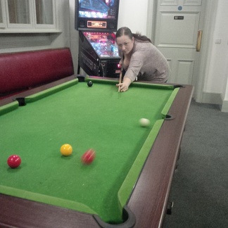 kirsty playing pool at the central.jpg