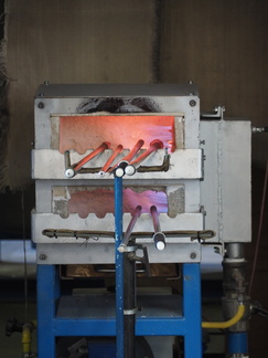 Glass-working irons in an oven