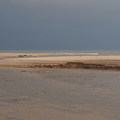 Long Nanny flowing into Beadnell Bay
