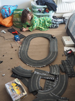 Isaac playing with Scalextric