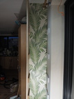 Wallpaper in the back of the new shelves